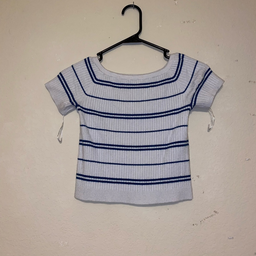 white and navy shirt